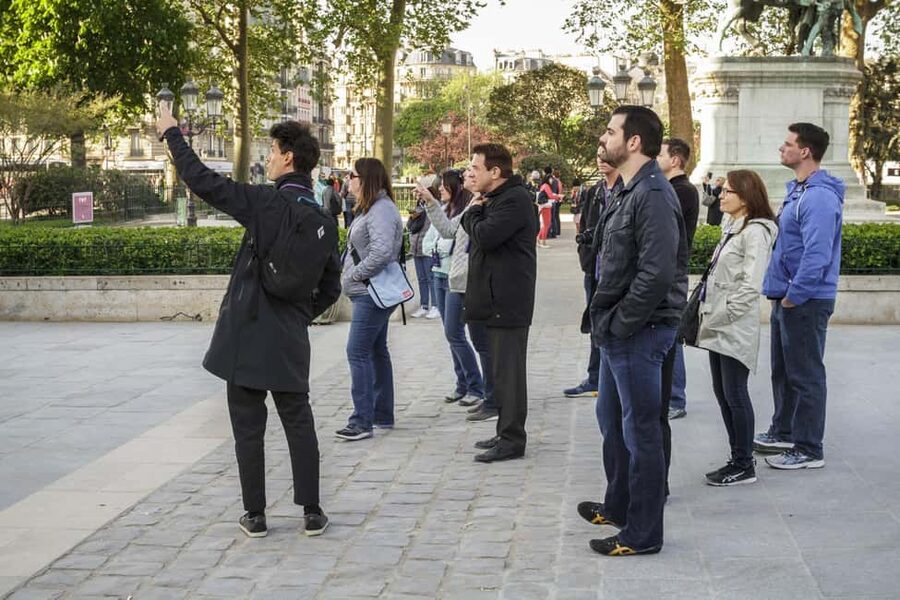 Paris: Notre Dame and Île de la Cité Walking Tour - The island walk: Sainte-Chapelle, Conciergerie, and Hôtel-Dieu in human terms