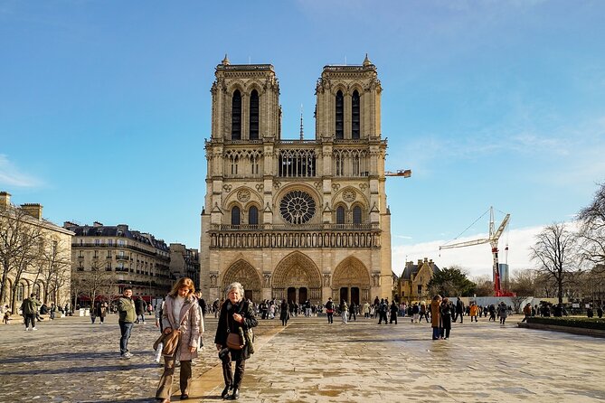 Paris: Notre-Dame Cathedral Interior & Ile de la Cité Guided Tour - Notre-Dame interior in a group of 5, not a herd