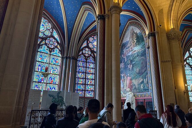 Paris: Notre-Dame Cathedral Interior & Ile de la Cité Guided Tour - The story on the facade: portals, Kings Gallery, gargoyles, and crowns