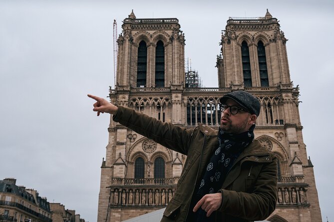 Paris: Notre-Dame Cathedral Interior & Ile de la Cité Guided Tour - Sainte-Chapelle and Conciergerie: great Gothic exteriors without the stress