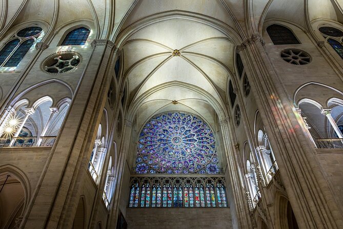 Paris: Notre-Dame Cathedral Interior & Ile de la Cité Guided Tour - Seine-side storytelling: monarchs, medieval buildings, and the flow of time