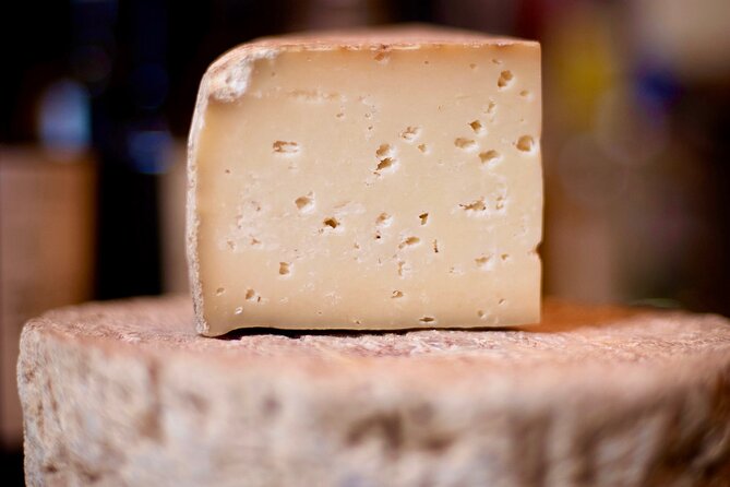 Paris: Notre Dame Gourmet Food & Wine Tour with a Culinary School - Place des Vosges and the Hôtel de Sully gardens walk-through