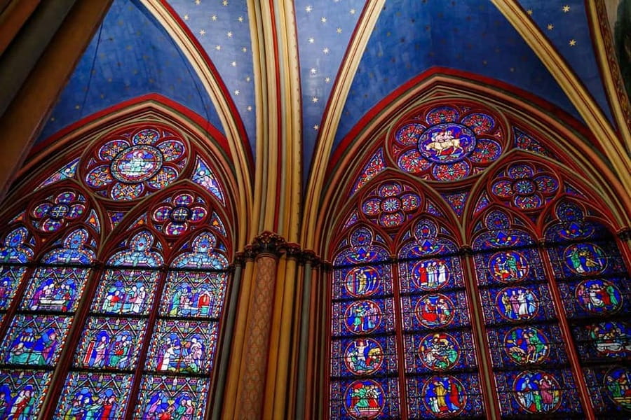 Paris: Notre-Dame Interior and Ile de la Cité Guided Tour - Inside Notre-Dame: flying buttresses, stonework, and stained glass