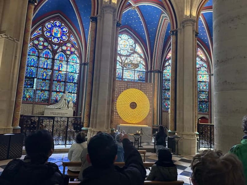 Paris: Notre-Dame Interior and Ile de la Cité Guided Tour - Sainte-Chapelle and the Conciergerie: iconic exteriors without extra entry fees