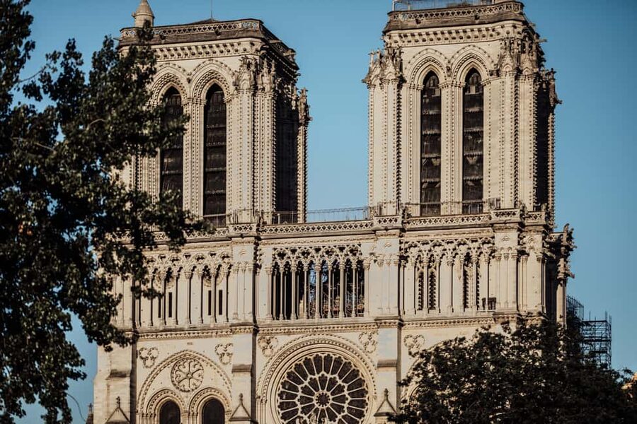 Paris: Notre-Dame The Restored Masterpiece Guided Tour - Exterior tour: portals, rose windows, gargoyles, and flying buttresses