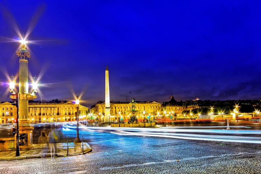 Paris: Panoramic Night Tour with Audio Guide and Host - A host is listed, but don’t bet your night on constant guidance