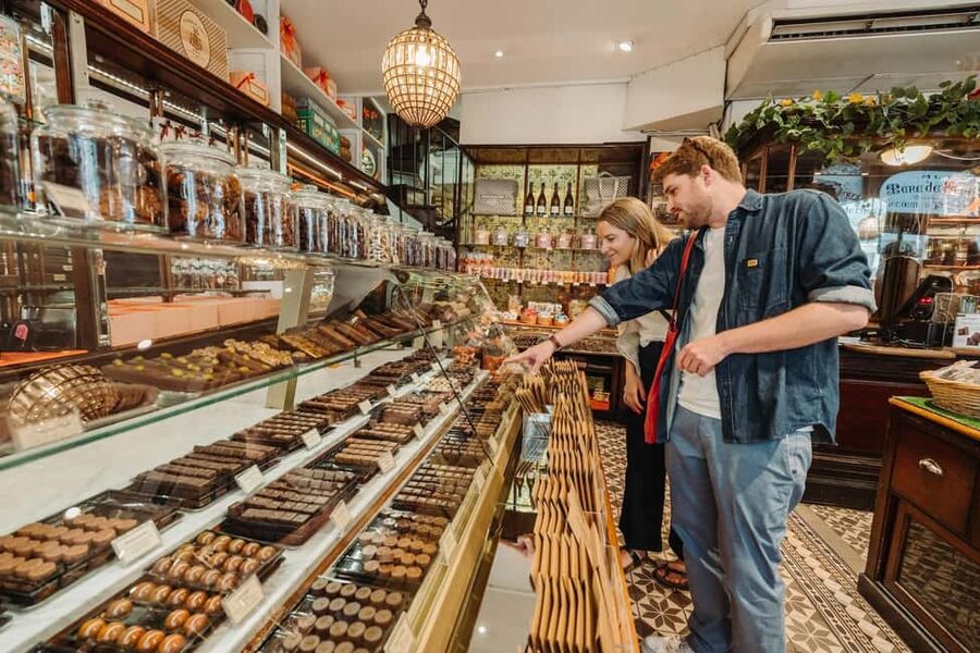 Paris: Pastries and Chocolate Walking Food Tour - Sliding into Paris covered passages, where the city slows down
