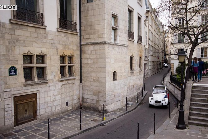 Paris Private Tour: Romantic Tour in a 2CV - A 2CV in Paris: why this feels more romantic than sightseeing