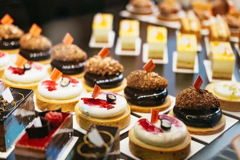 Paris: Saint Germain des Prés Guided Foodie Walking Tour - Starting at Église Saint-Germain-des-Prés, then walking the 6th arrondissement