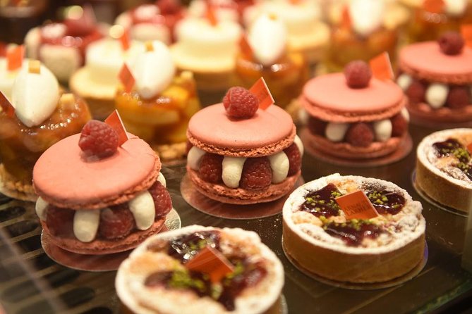 Paris Saint-Germain French Gastronomy Tasting Food Tour - What you will actually taste: sweets, savory bites, cheese, olive oil, and wine