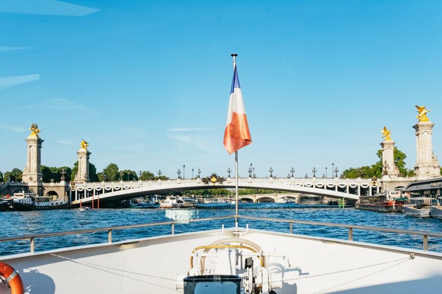 Paris: Seine River Panoramic Views Dinner Cruise - What the boat is like: armchairs, panoramic windows, and the terrace