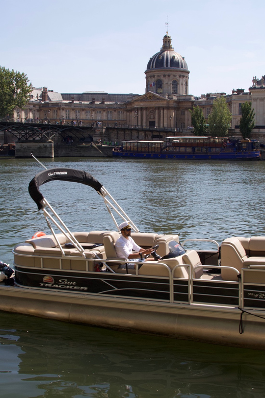 Paris: Seine River Private Guided Pontoon Boat Cruise - The pontoon boat setup: modern comfort, your space, and Bluetooth audio