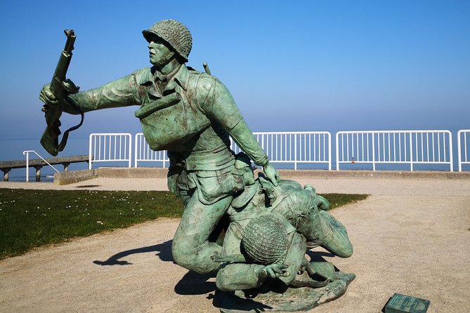 Pointe du Hoc,Omaha Beach, American Cemetery - Day trip from Paris to Normandy - Arromanches and the Mulberry harbour remains: the landing’s supply system