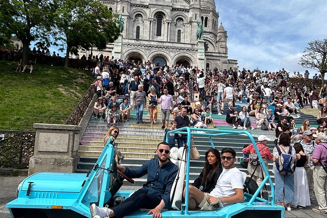 Private 2 - Hour Paris Landmarks Tour by Golf Cart Mini Moke - The Louvre from Royal Palace Square, fast and photo-first