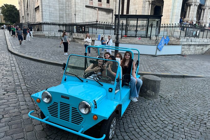Private 4 - Hour Paris Highlights Tour by Golf Cart Mini Moke - Champs-Élysées, Concorde, Place Vendôme, and Palais Garnier, the classic boulevard beat