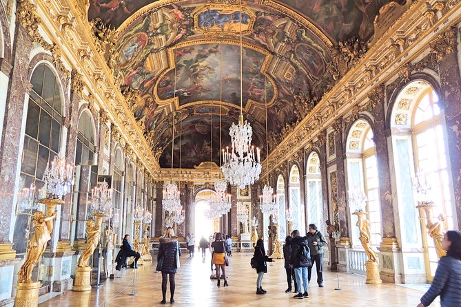 Versailles and Louvre Museum Access and Tour - The transition back to Paris, then Louvre time