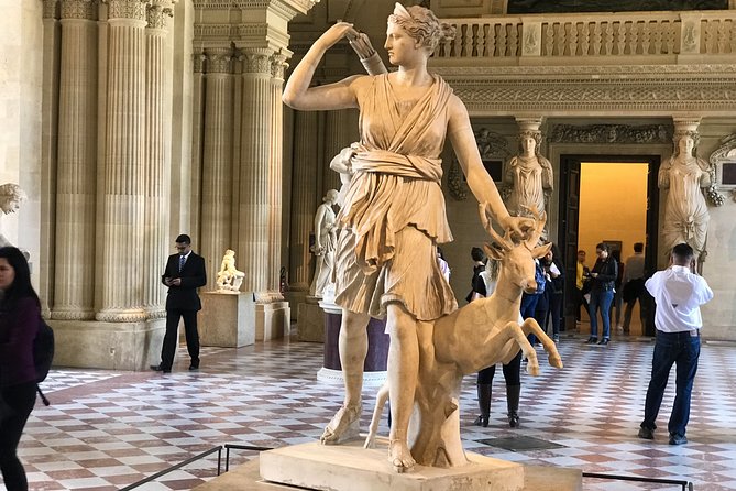 Versailles and Louvre Museum Access and Tour - Louvre Museum highlights tour that keeps you moving the right direction