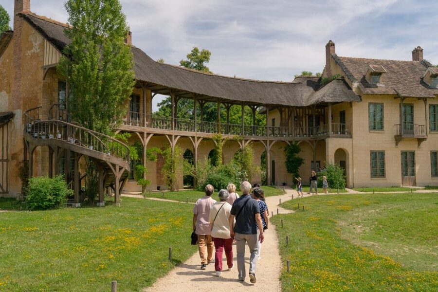 Versailles: Marie Antoinette Petit Trianon & Estate Tour - Walking the private gardens, with context behind the paths