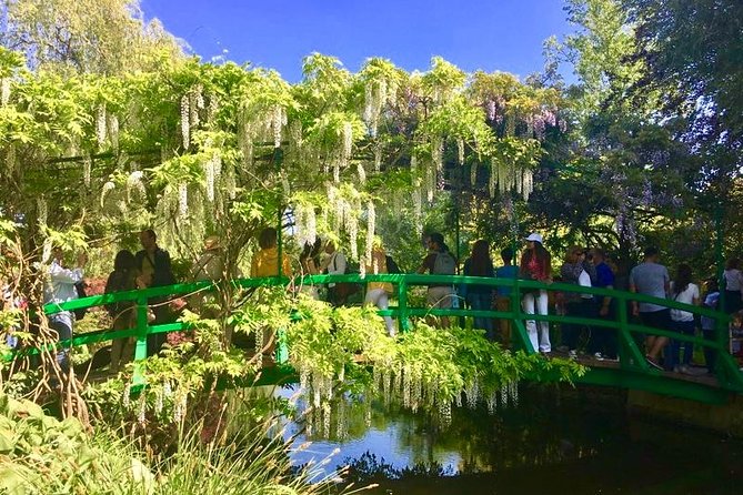 Versailles Palace & Giverny Private Tour with Lunch&Hotel Pick-up - Village time in Giverny: flowered streets, cafes, and art shops