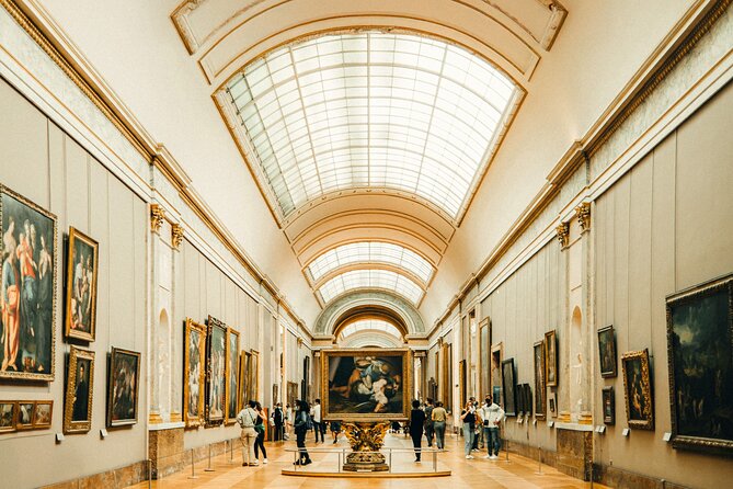 VIP Louvre Mona Lisa & Highlights Tour with Reserved Access - Stop 1: Mona Lisa Gallery, built for the crowd moment